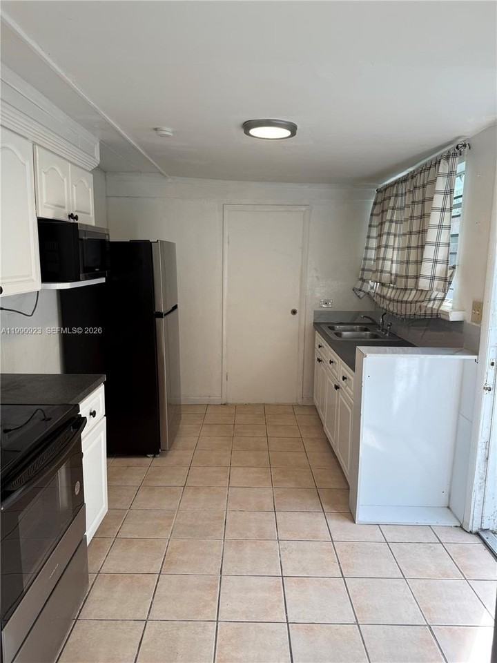 1230 Nw 180th Ter #1 - Photo 3 of 6