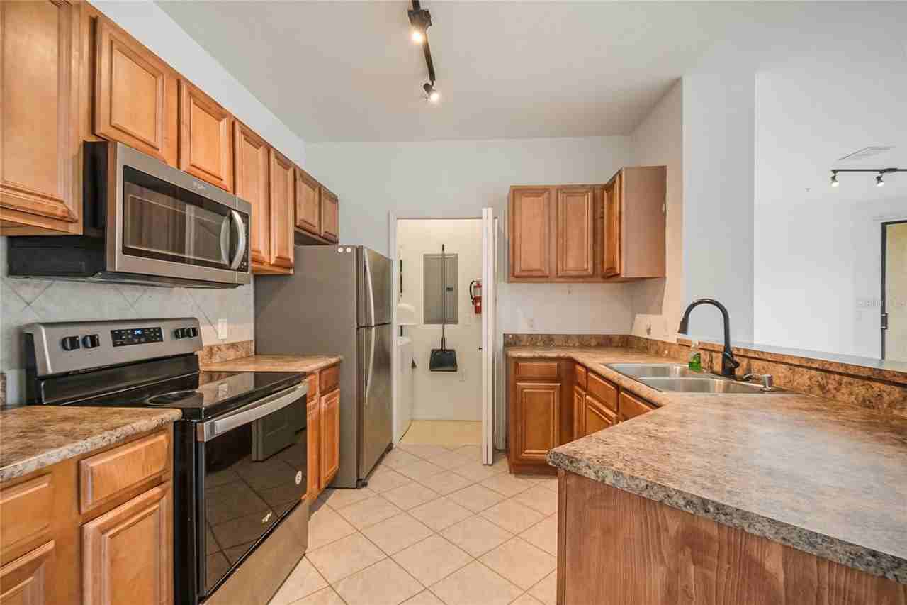 6157 Metrowest Blvd #202 - Photo 2 of 24
