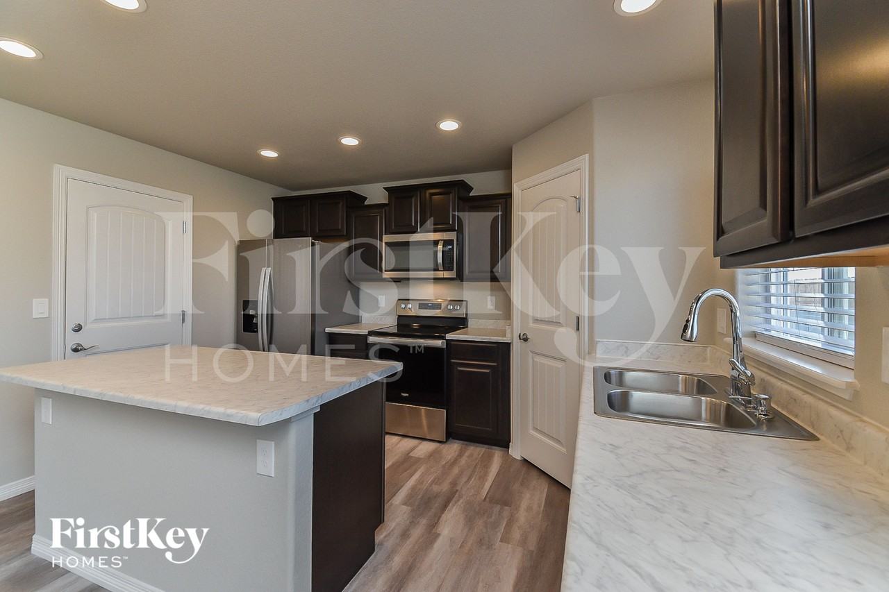 10823 Witcher Dr - Photo 3 of 15