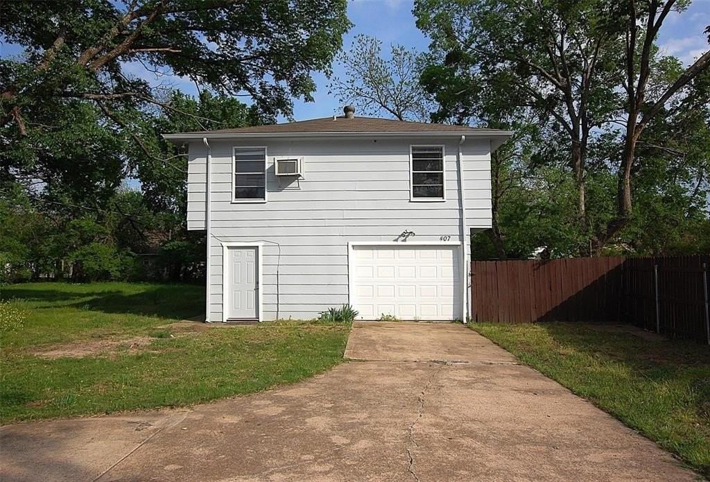 407 S Bois D Arc St - Photo 2 of 19