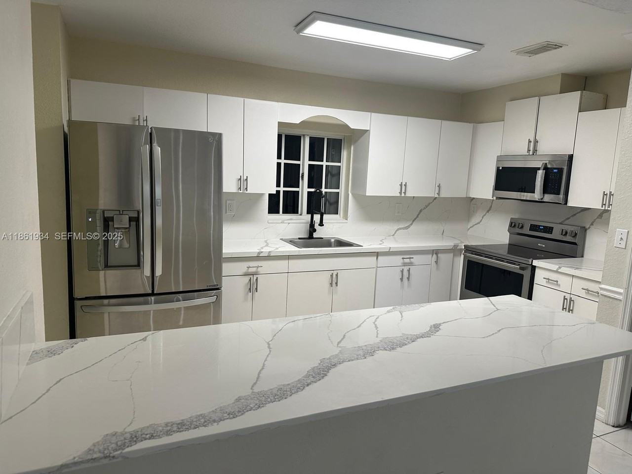 7640 Northwest 182nd Terrace #108 - Photo 3 of 37