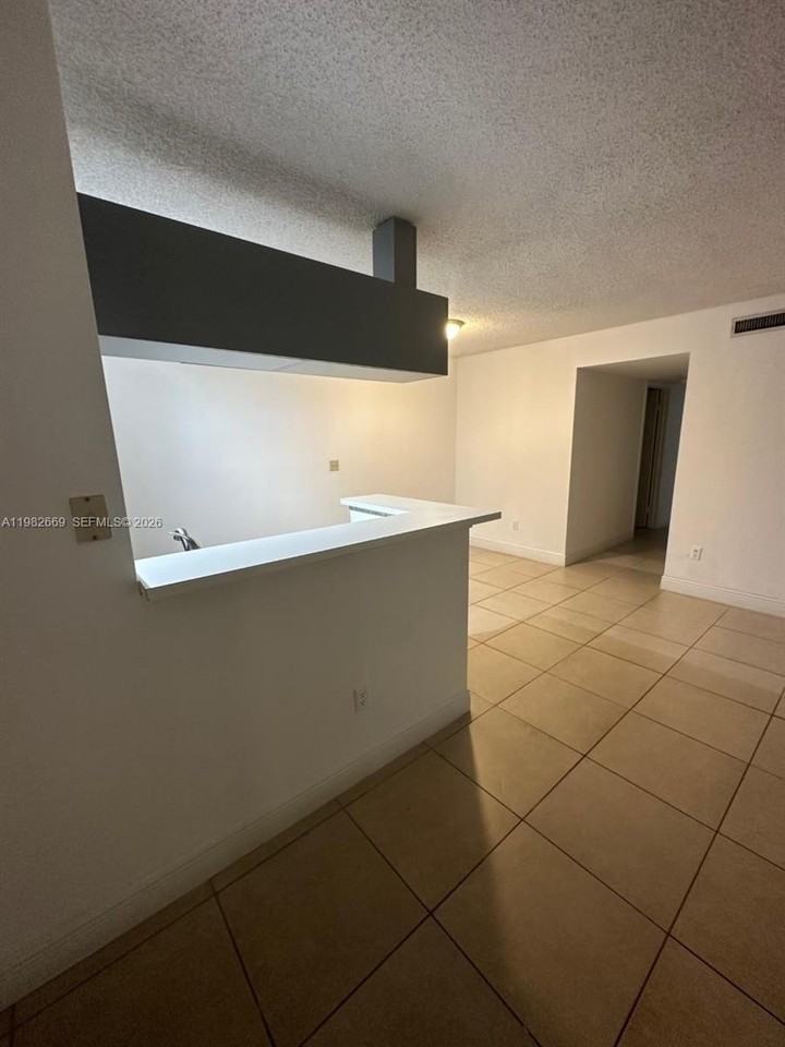 9723 Hammocks Blvd #108 - Photo 2 of 14