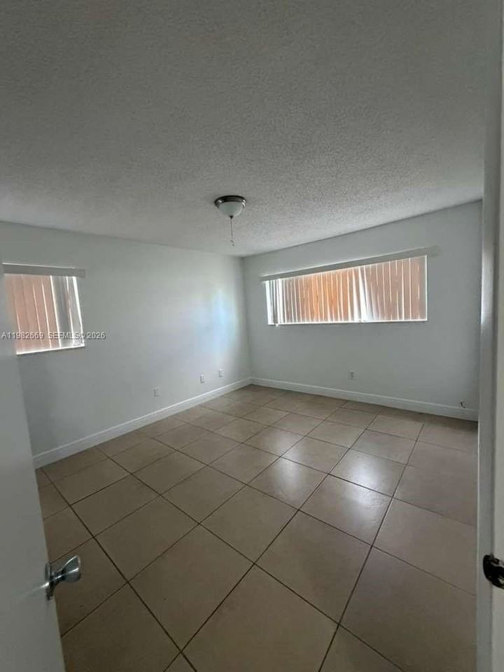 9723 Hammocks Blvd #108 - Photo 5 of 14