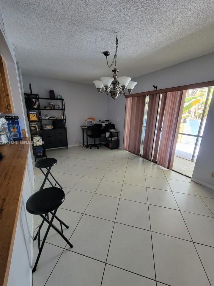 9787 Riverside Dr #62-4 - Photo 5 of 31