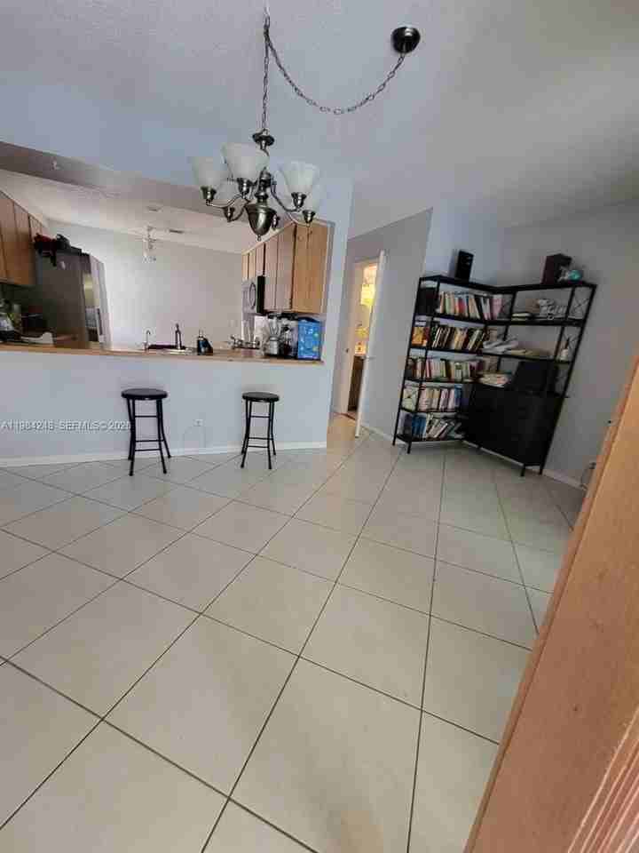 9787 Riverside Dr #62-4 - Photo 6 of 31
