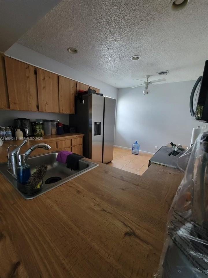 9787 Riverside Dr #62-4 - Photo 7 of 31