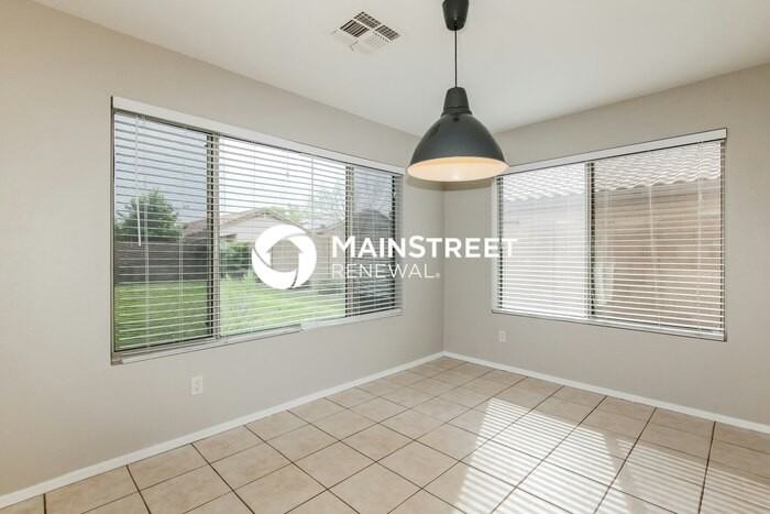 7013 W Aire Libre Ave - Photo 5 of 17