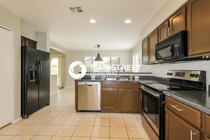 7013 W Aire Libre Ave - Photo 7 of 17