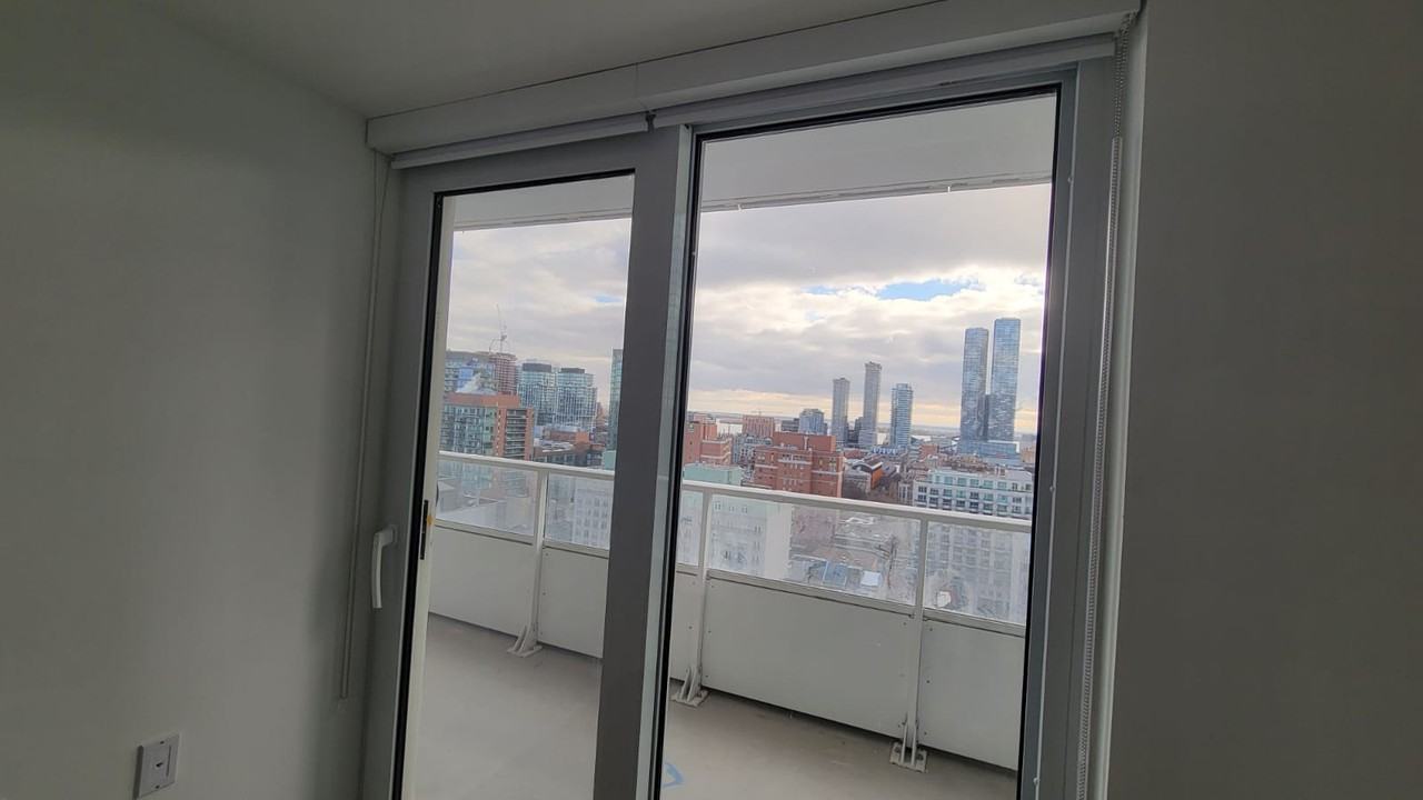 Yonge St & Queen St E - Photo 6 of 38