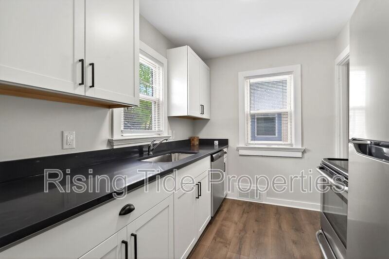 1512 Emmons Ave - Photo 5 of 17