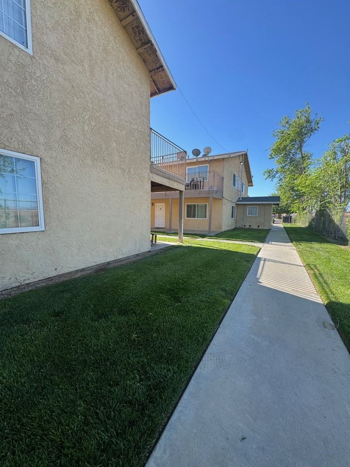 Casa Adelanto Apartment Homes - Photo 6 of 15