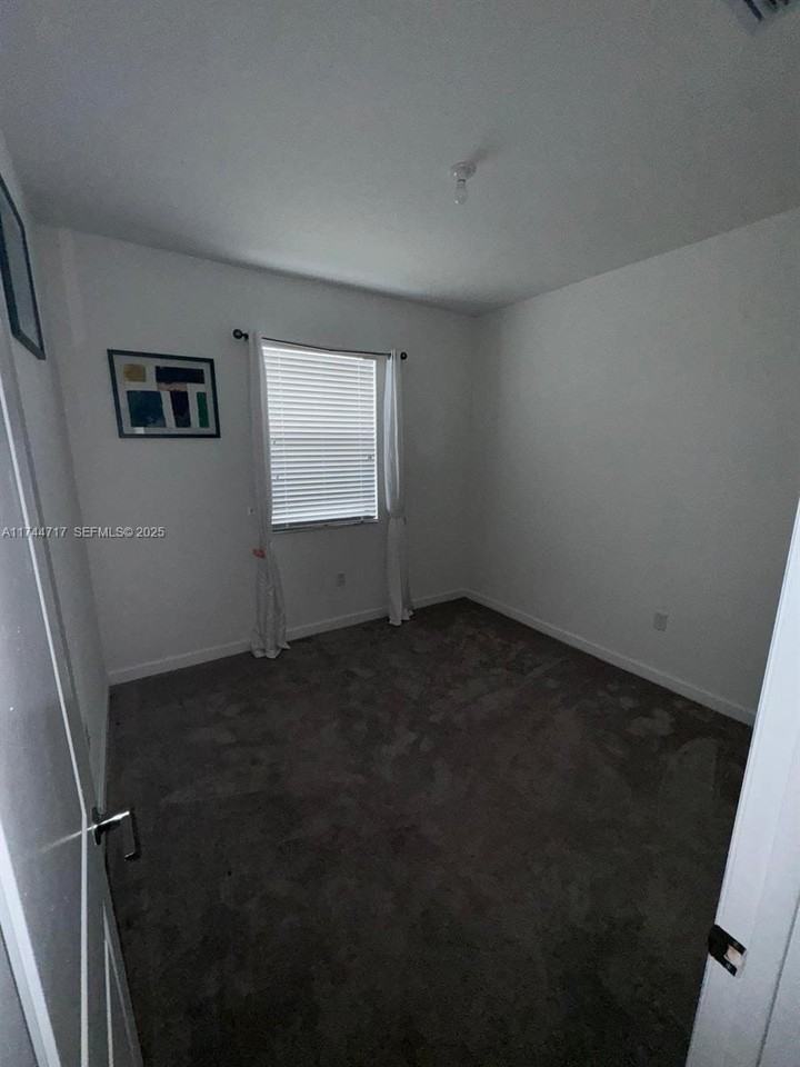 10021 Southwest 231st Lane #10021 - Photo 3 of 10