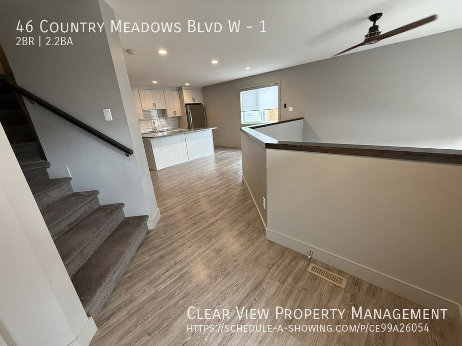 46 Country Meadows Blvd W #1 - Photo 3 of 22