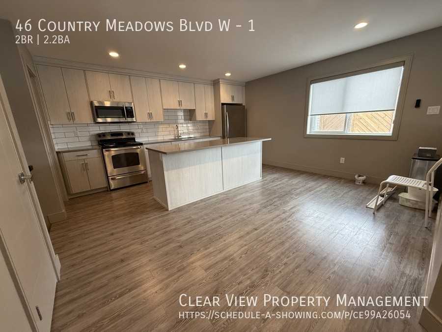 46 Country Meadows Blvd W #1 - Photo 4 of 22