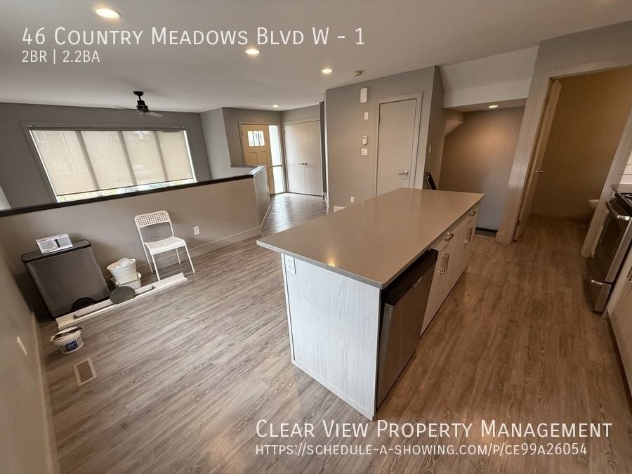 46 Country Meadows Blvd W #1 - Photo 6 of 22