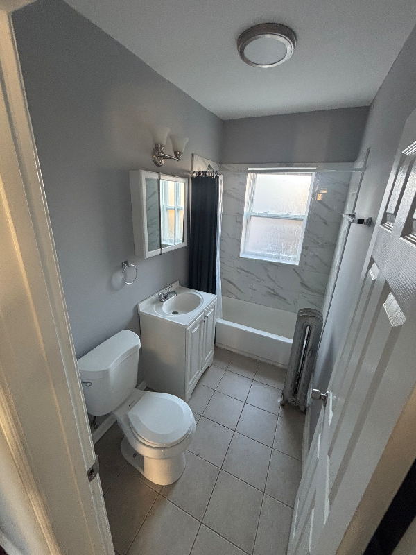 7657 S Coles Ave #3A - Photo 3 of 5