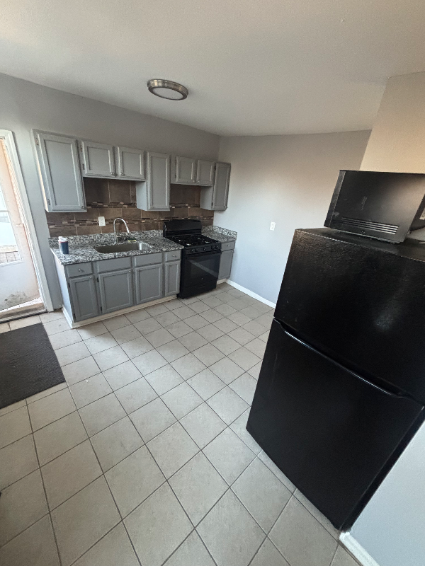 7657 S Coles Ave #3A - Photo 5 of 5