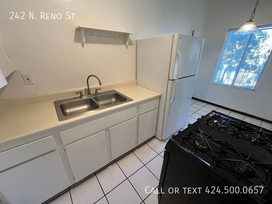 242 N Reno St - Photo 3 of 7