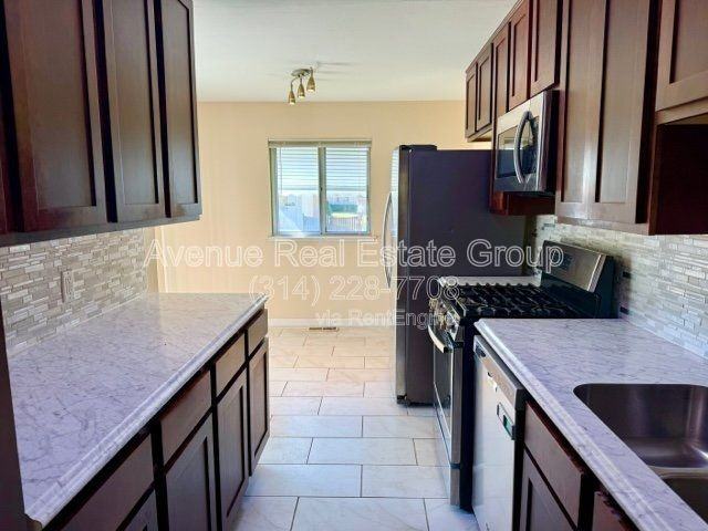 11090 Alan Shepard Dr - Photo 3 of 13