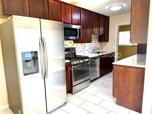 11090 Alan Shepard Dr - Photo 4 of 13