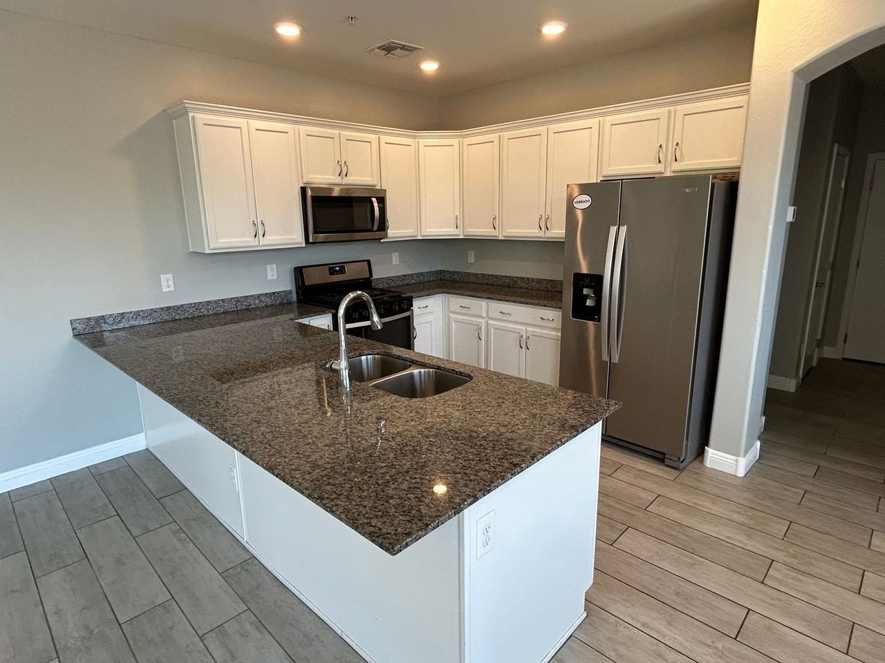 1704 N 208th Ave - Photo 4 of 27