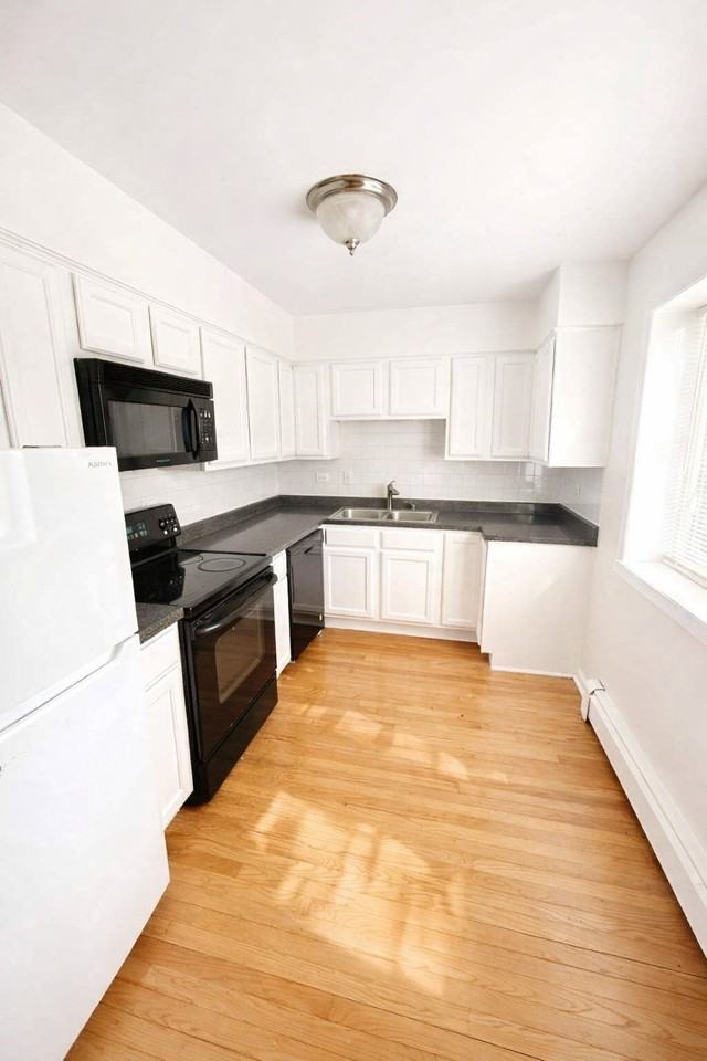 1404 W Estes Ave - Photo 3 of 38