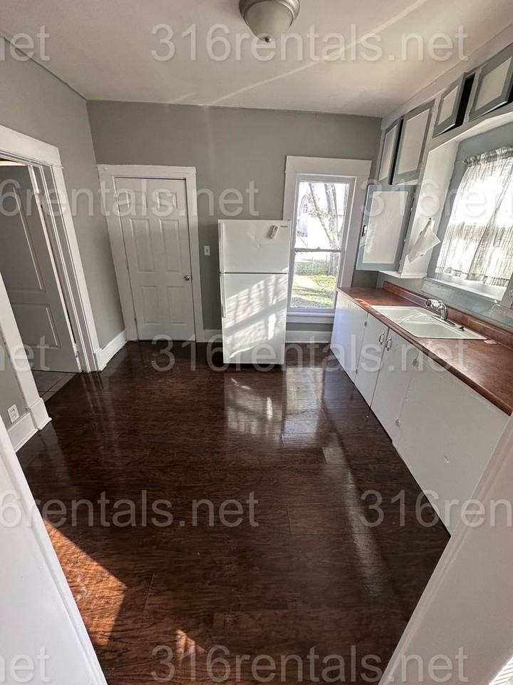 1146 S Ellis St - Photo 4 of 7