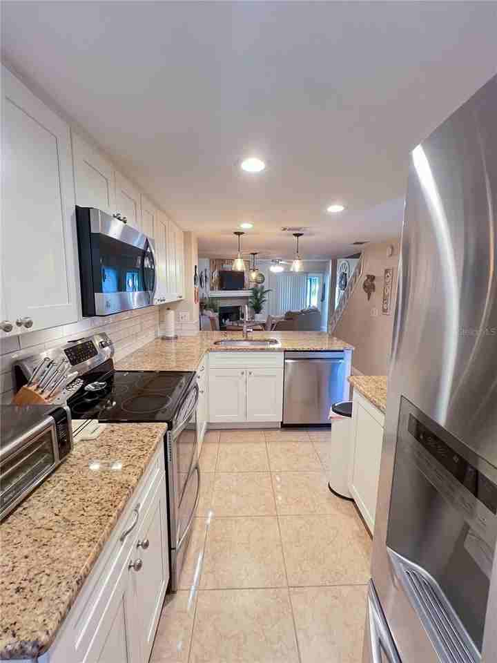 6721 121st Ave #E - Photo 4 of 19