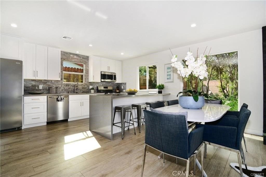 7509 Kentland Ave - Photo 3 of 16