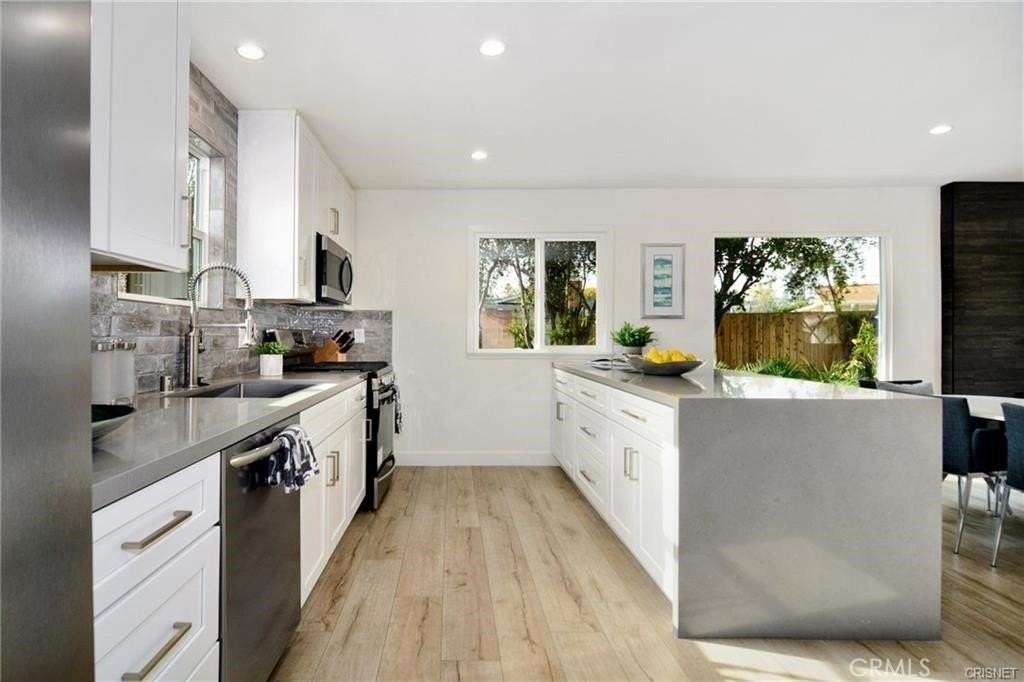 7509 Kentland Ave - Photo 5 of 16