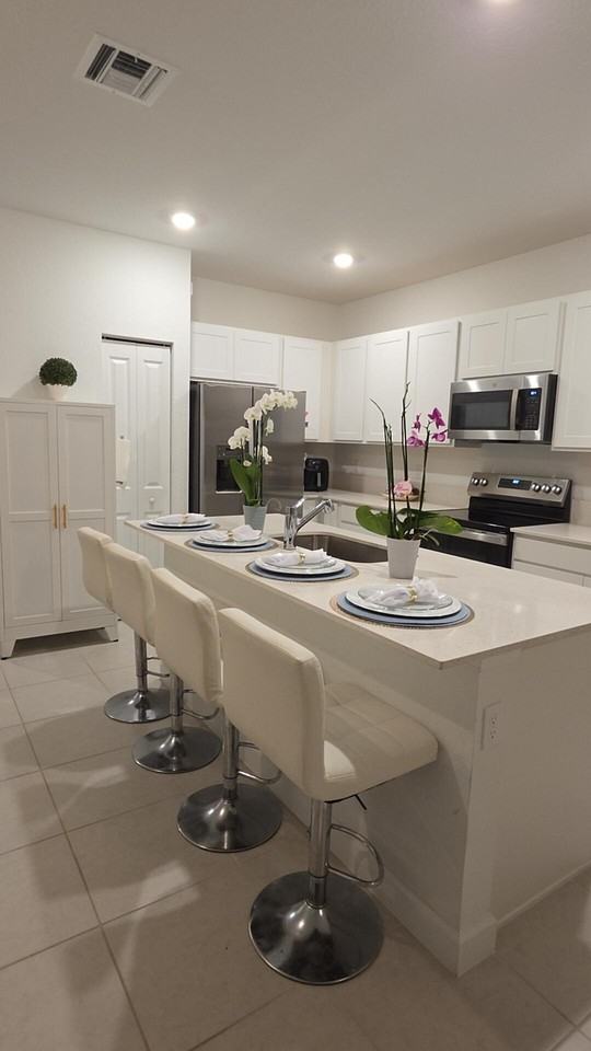 512 Se Rivergrass St - Photo 6 of 10