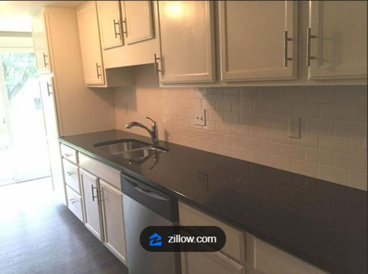 326 7th Ave W - Photo 3 of 4