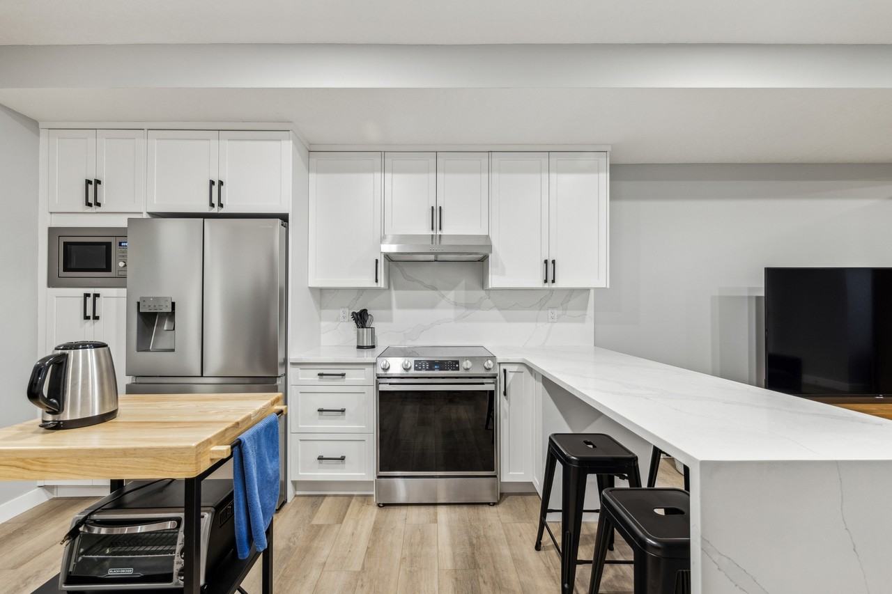 7136 34 Avenue NW, Calgary - Photo 7 of 29