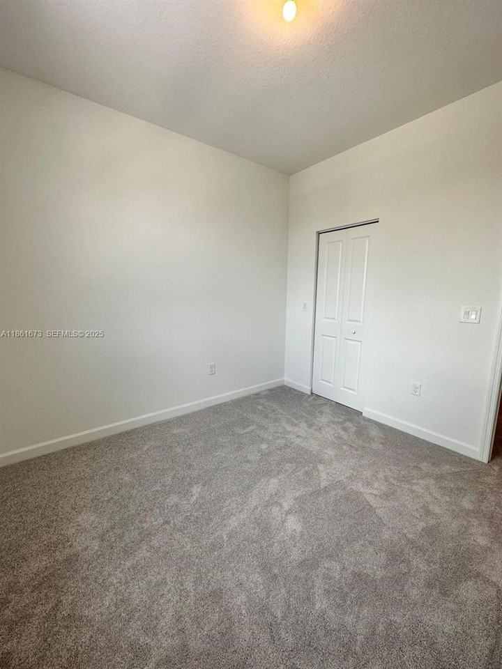 11965 Northwest 47th Manor - Photo 4 of 24