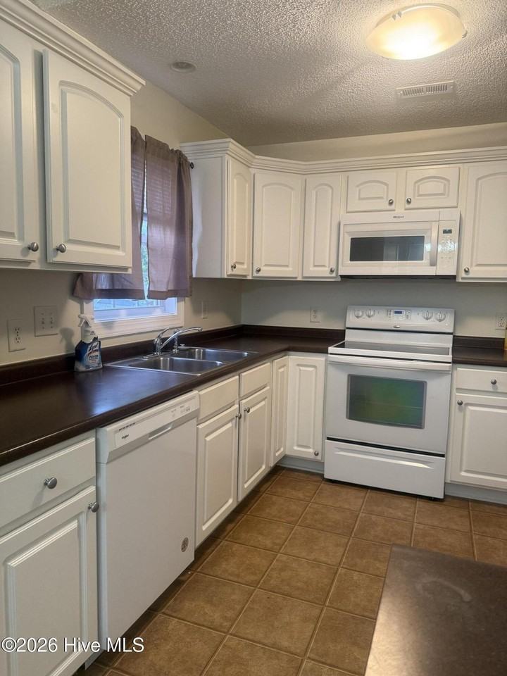 1313 Old Village Rd - Photo 7 of 16