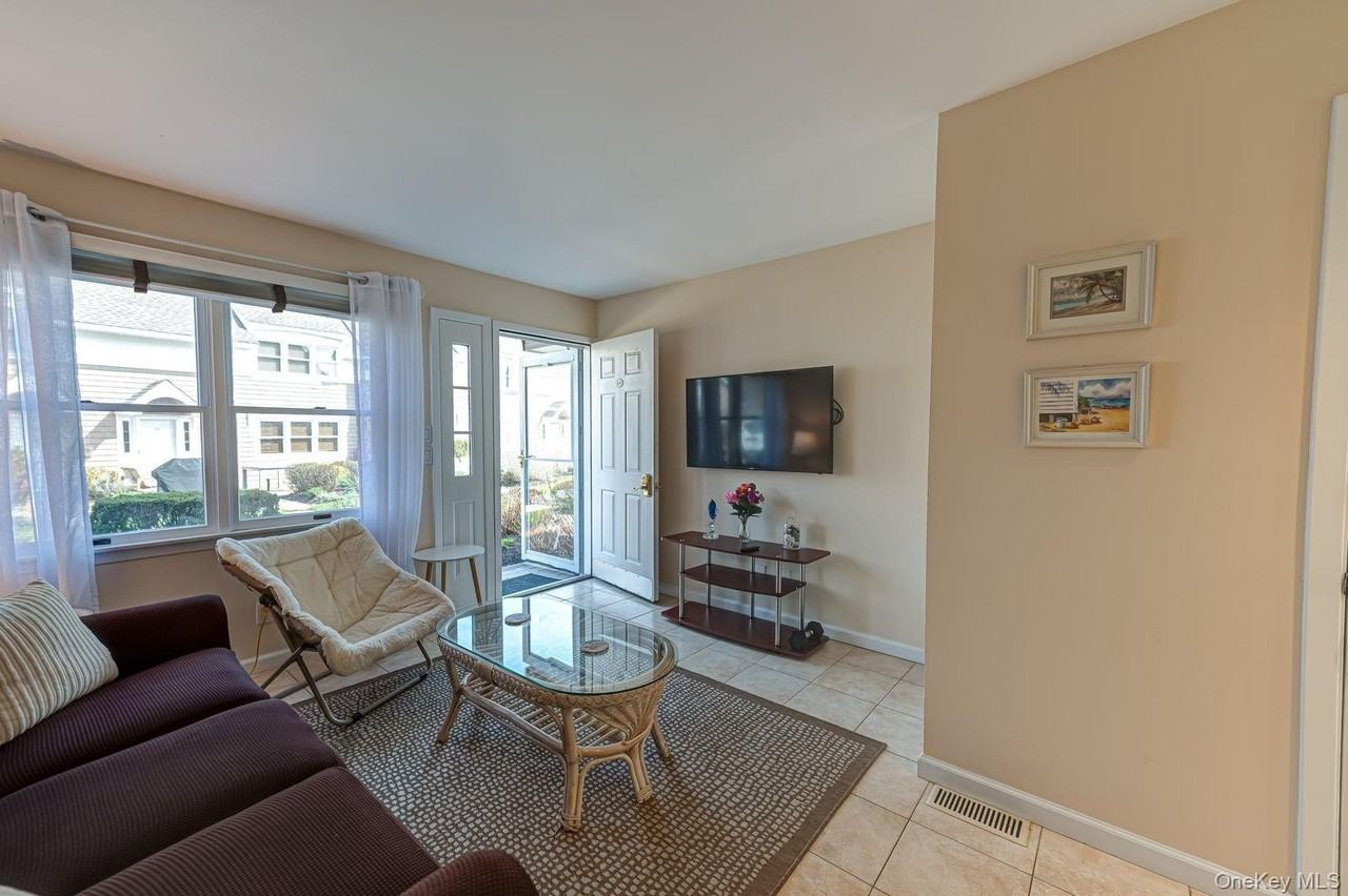 49 Canoe Place Rd #212 - Photo 3 of 22