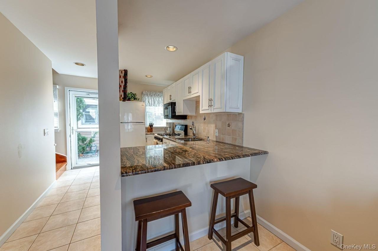 49 Canoe Place Rd #212 - Photo 5 of 22