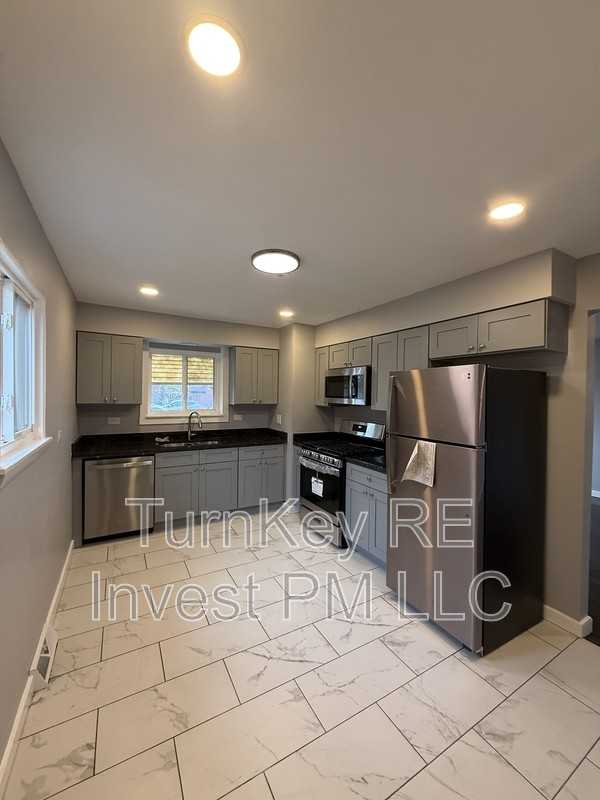 7732 Lotus Ave - Photo 2 of 8