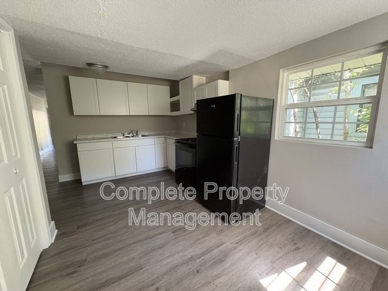 725 Avenue G - Photo 3 of 7