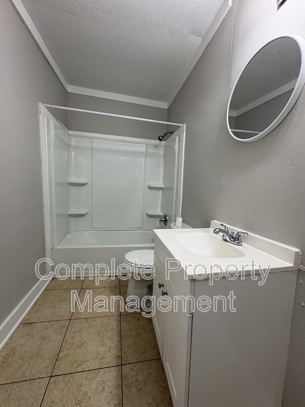 725 Avenue G - Photo 6 of 7