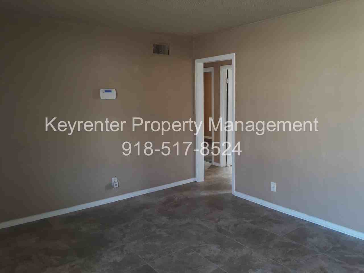 636 E 49th Pl N - Photo 2 of 17