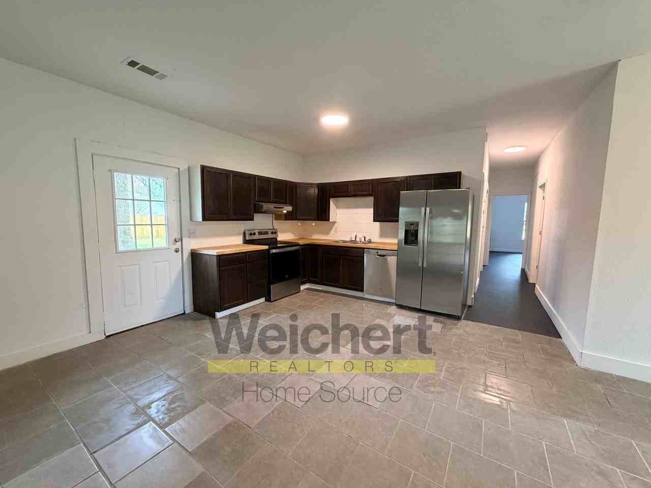 1310 Barton Ln - Photo 3 of 8