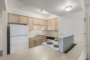 Welcome to The Bluffs – Comfort, Convenience & Value in the Heart of Gladstone - Photo 1 of 1
