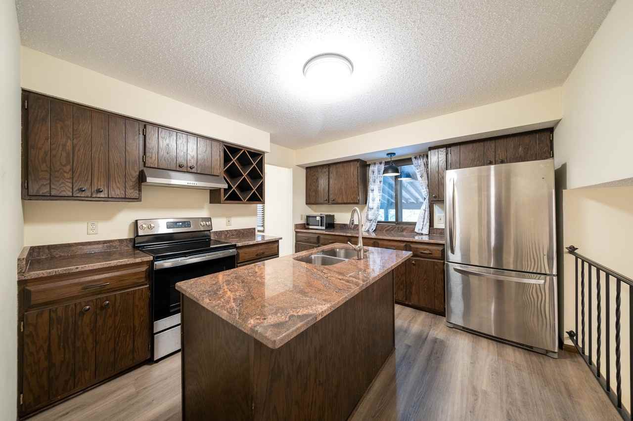 6900 Woodland Dr #1 - Photo 3 of 31