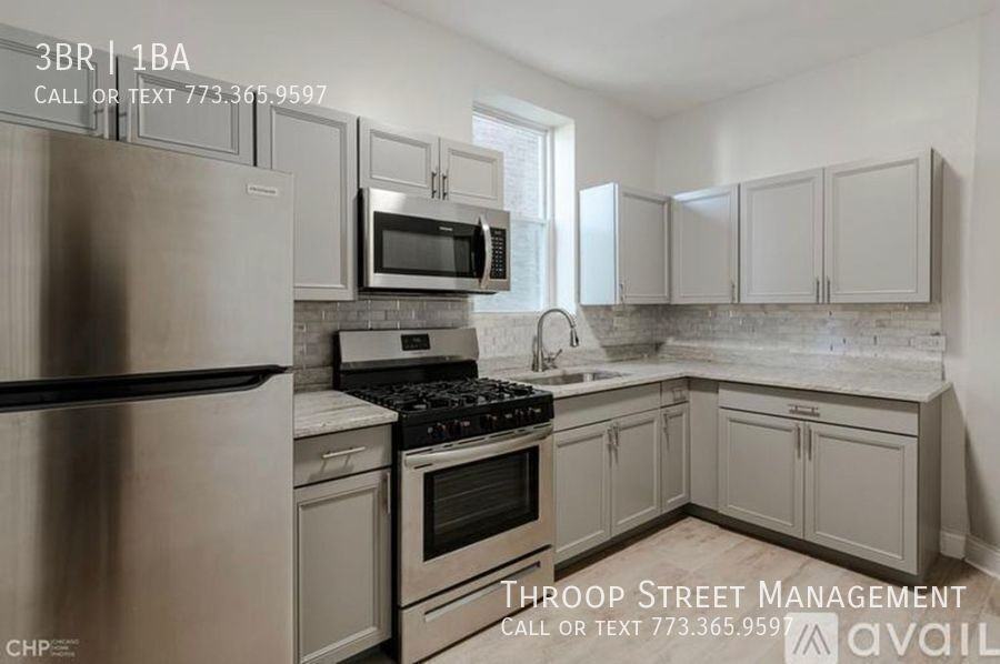 6032 S Saint Lawrence Ave Apt 1 - Photo 2 of 13