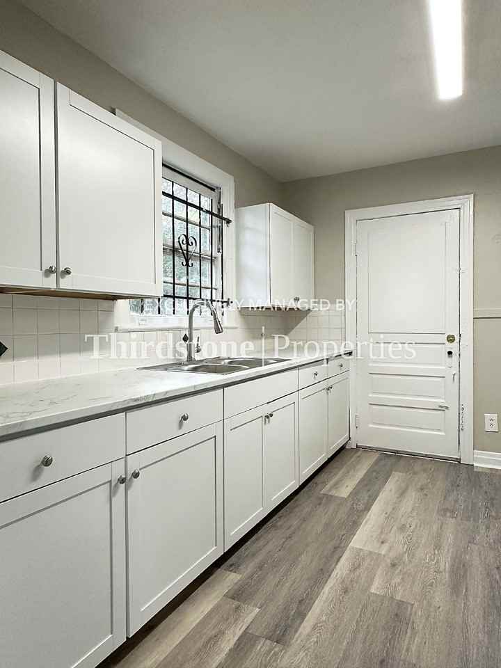 562 W 49th St - Photo 5 of 16