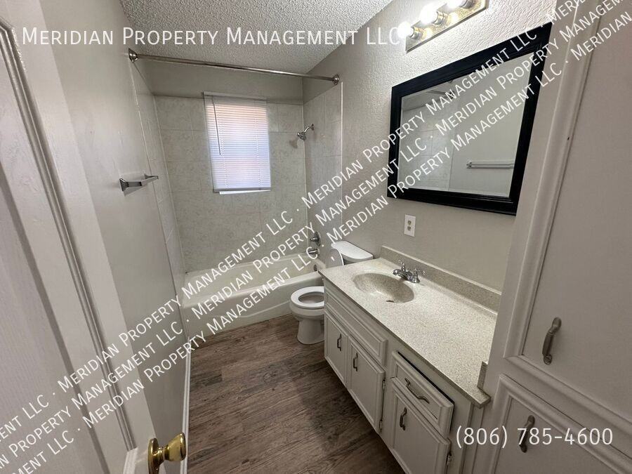 7303 Avenue X #105 - Photo 6 of 9
