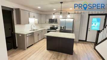 featured image of 335 E 3rd Ave
