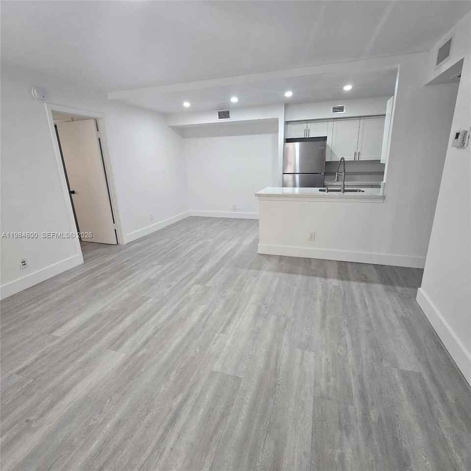 10020 Winding Lake Rd #104 - Photo 4 of 21