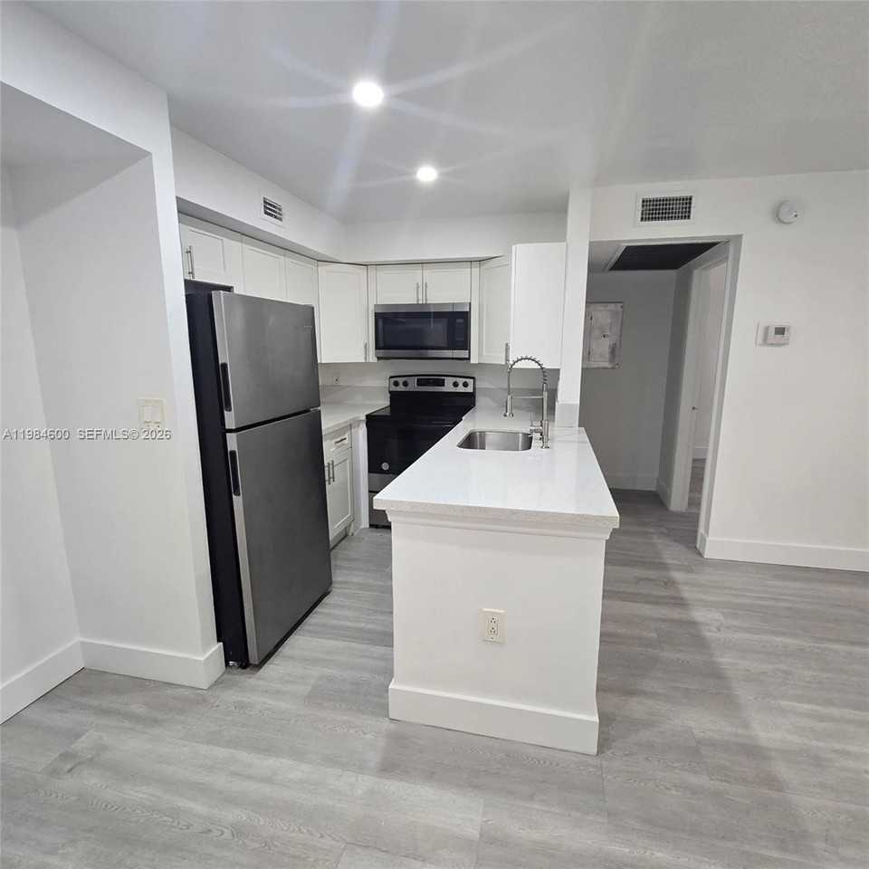 10020 Winding Lake Rd #104 - Photo 5 of 21